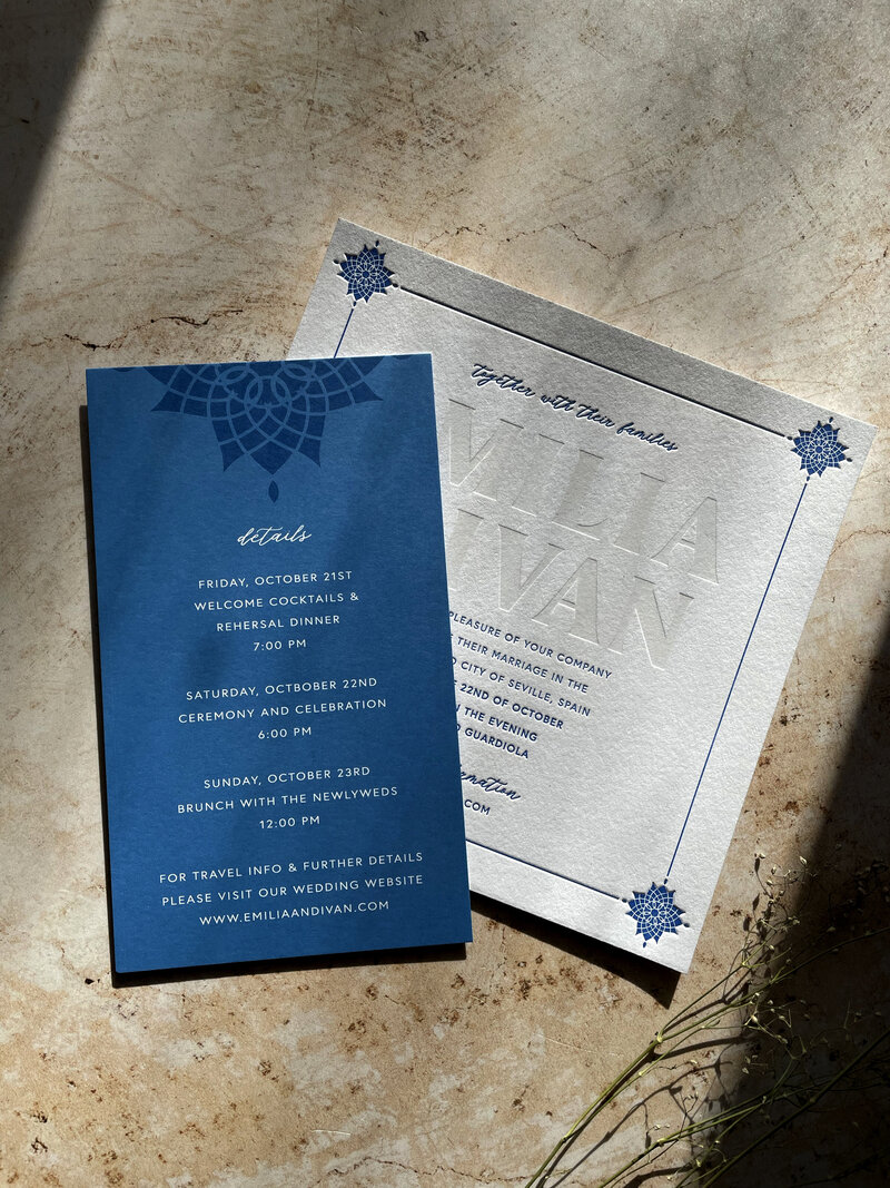 blue wedding details card and letterpress wedding invitation