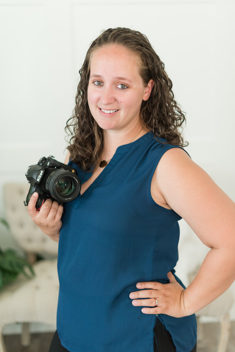 Owner and creator of Silverbridge & Co. Erica with her Nikon DSLR Camera
