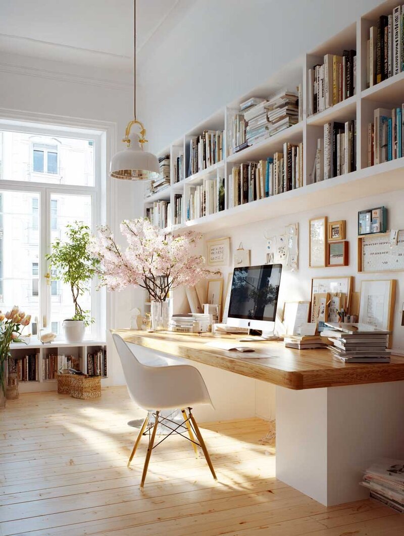 Bright living room with brown leather armchair