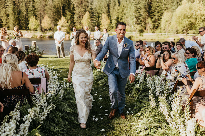 Bride & Groom walking down the aisle after saying I do in Coeur d'Alene, Idaho