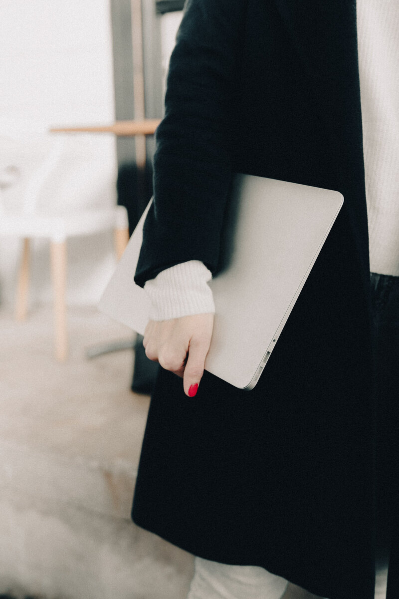 Woman holding notebook