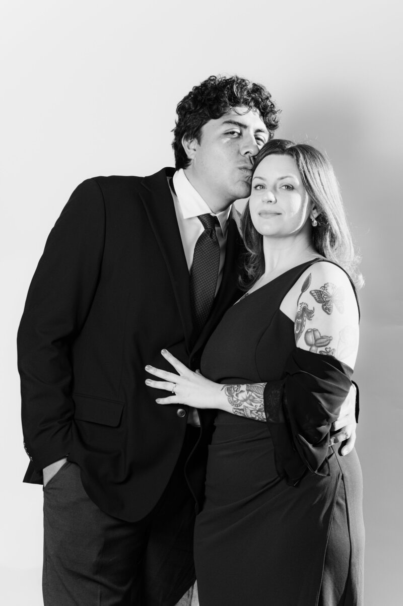 Elegant black and white couple portrait captured at a Vogue Portrait photo booth in Richmond, VA during a wedding cocktail hour.