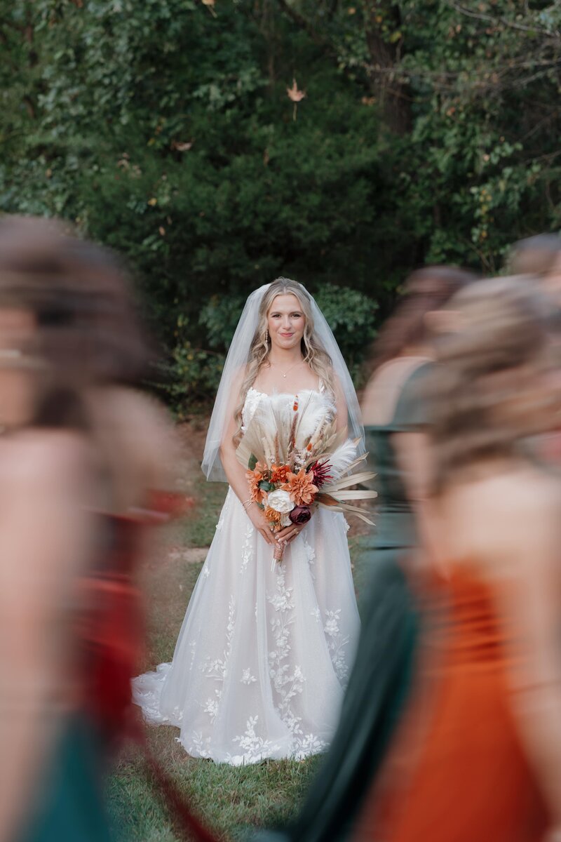 Bride smiling, at Vecoma at the Yellow River near Stone Mountain.