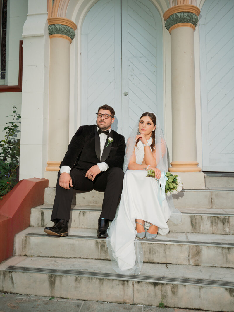 couple under a veil on there wedding day