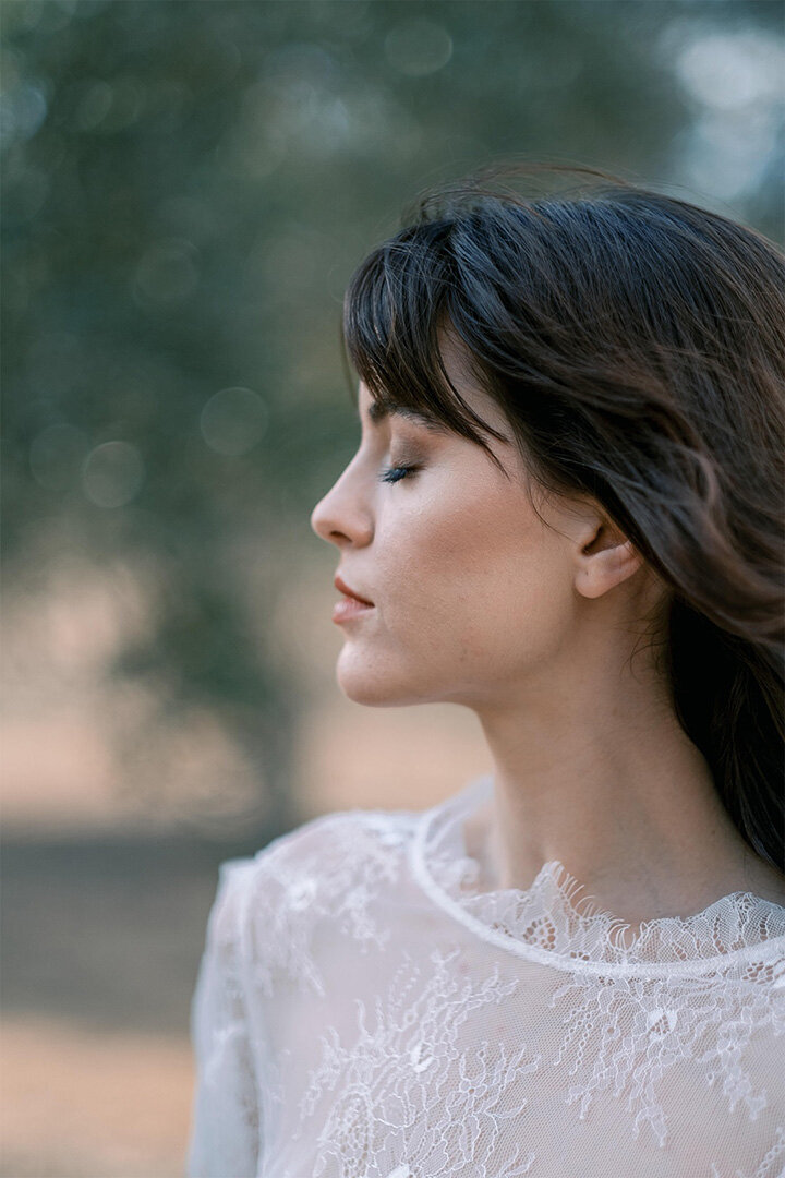 Bride posing in a stunning landscape, gavin morgan james, wedding photography, destination wedding photographer