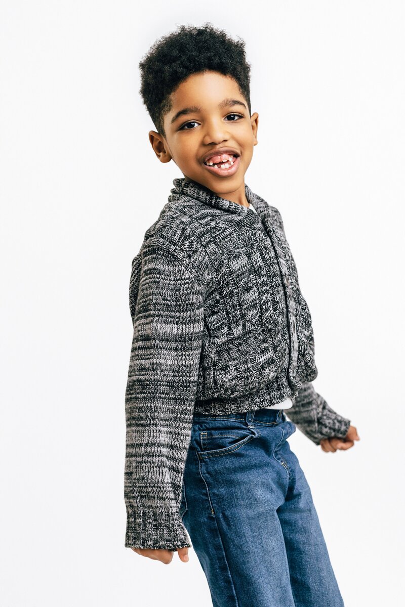 joyful child portrait by Angela Vaughns, lifestyle photographer in DC.