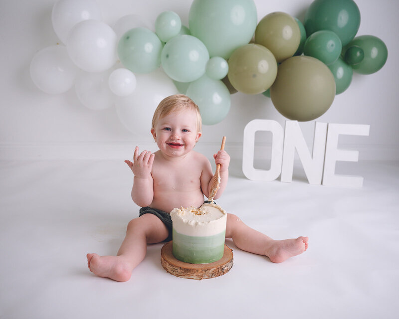 little girl first birthday cake smash