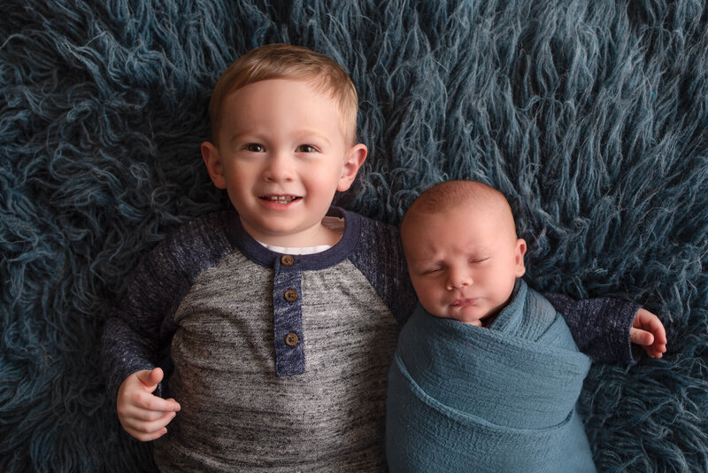Appleton Newborn Photo toddler sibling in studio |  Glory Be Photo by Tara Bos