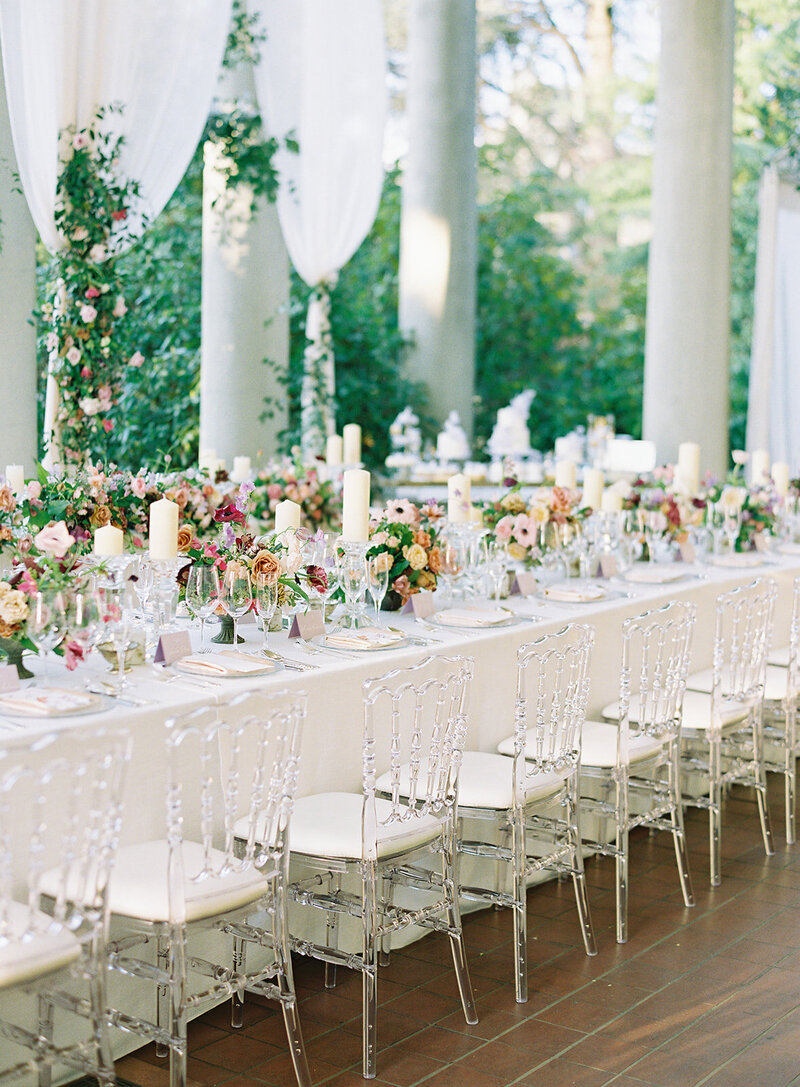 draping with florals and chairs at reception