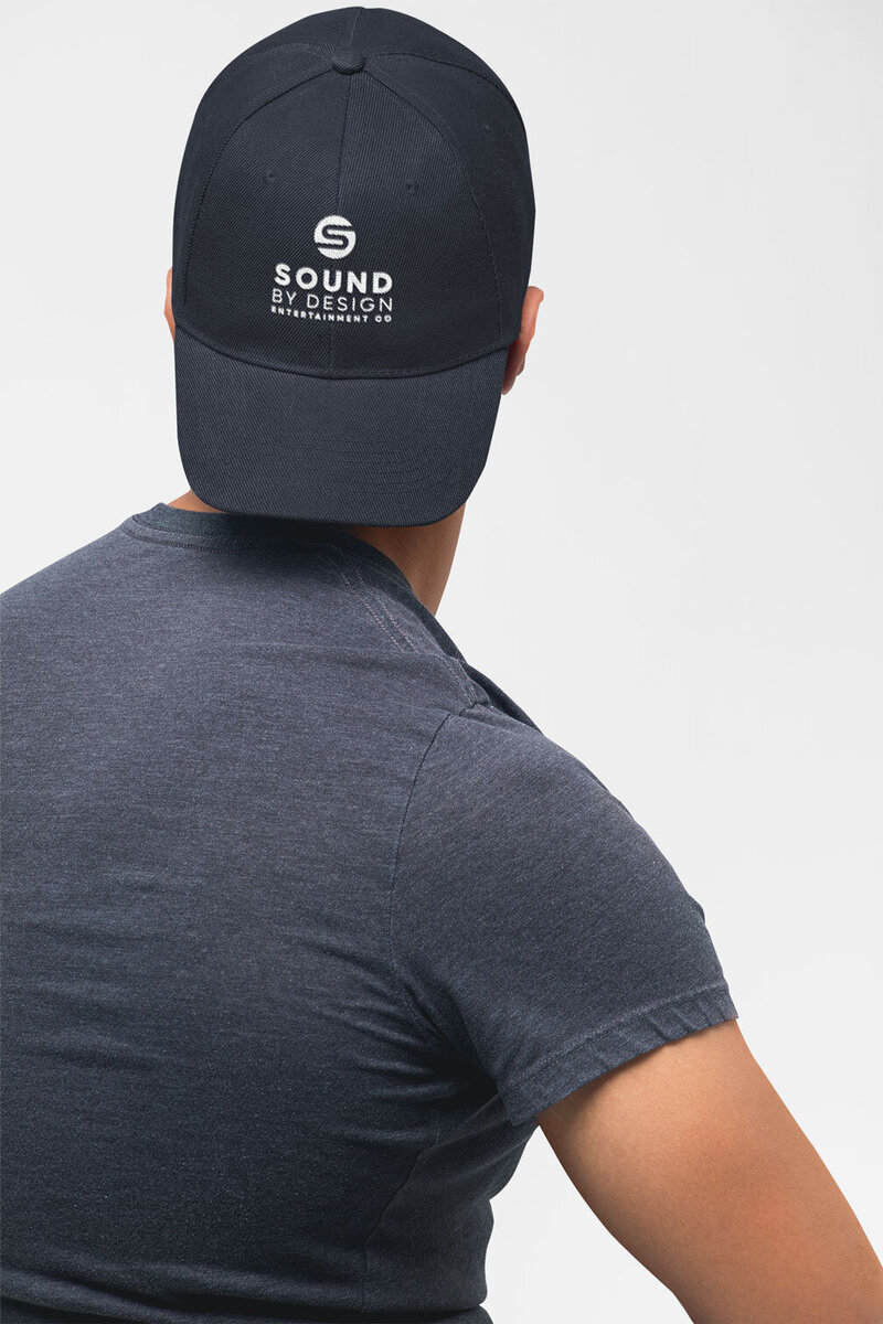 mockup-of-a-man-facing-the-wall-wearing-a-dad-hat-in-a-studio-27043