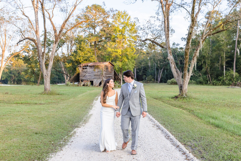 "Romantic couples portrait in front of a rustic barn in southeastern NC"