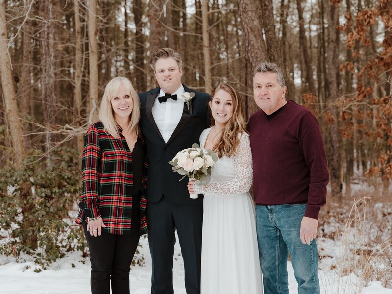 bride and groom with family at New Jersey wedding