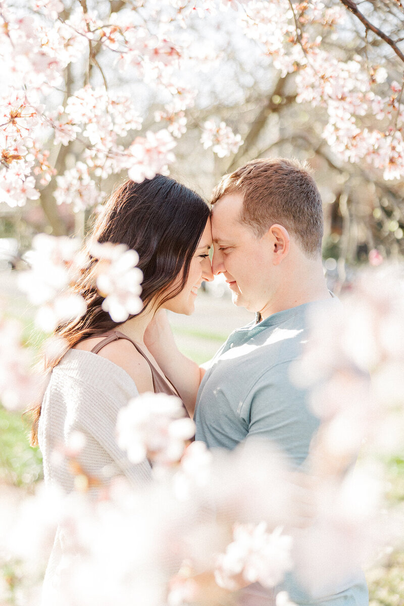 couple surrounded by flowers