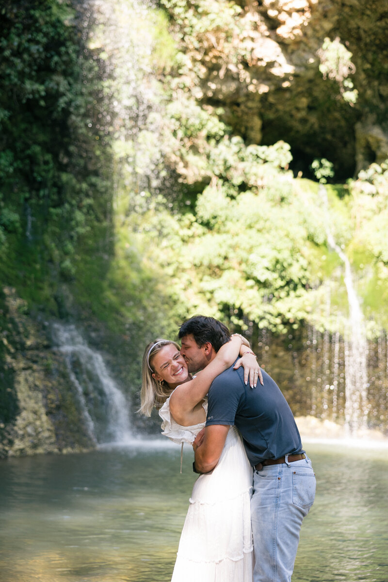 Couple at Waterfall – Northwest Arkansas Destination Engagement Photography