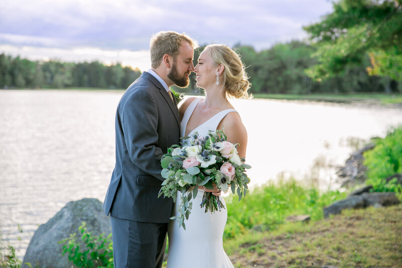 Closer image of Bride and Groom kissing near the lake | Klein Wedding in Harmony, Maine taken by Wedding Photographer