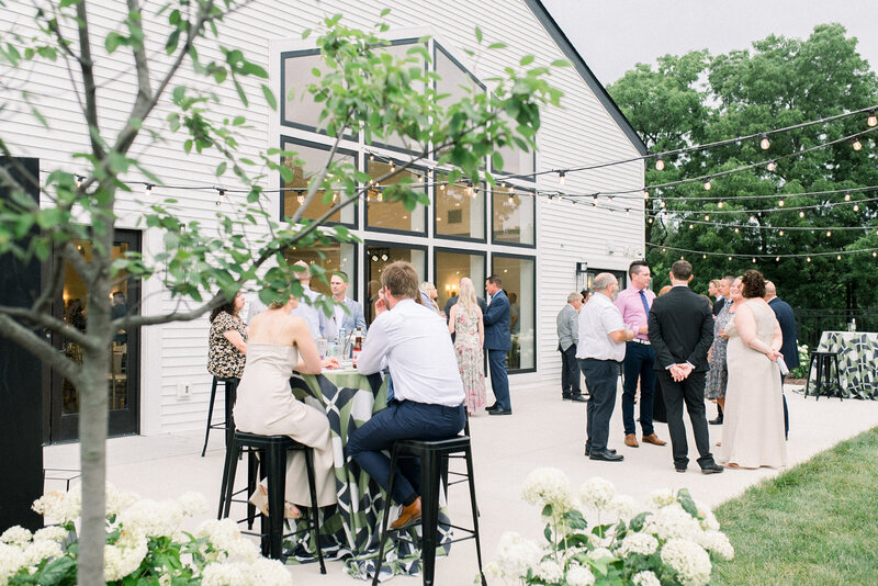 The Eloise's back patio with guests during cocktail hour