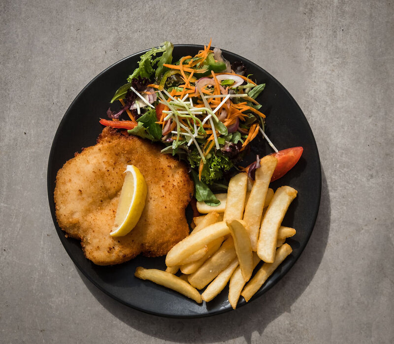 Chicken Schnitzel with chips and salad