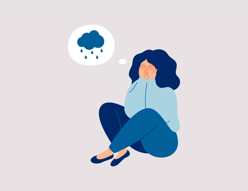 An adult covering their face with a rain cloud hovering close by. Representing how depression symptoms can overcome your life. Schedule therapy for depression in American Fork, UT today!