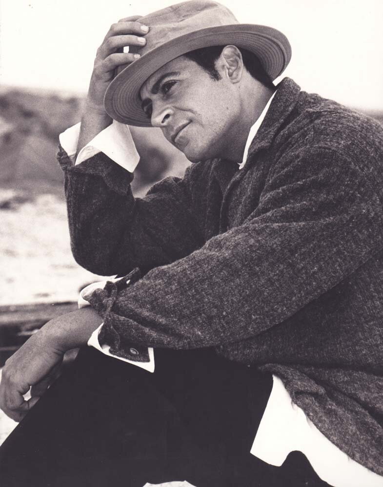 Man sitting wearing cowboy hat