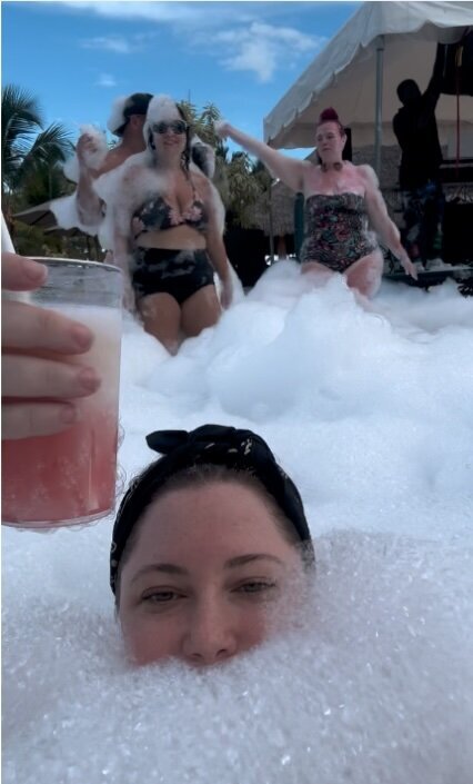Dana covered in foam during resort research
