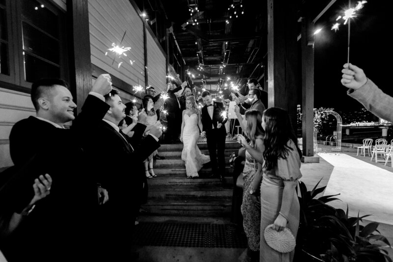 Bride and groom walk up memorial steps at their DC wedding