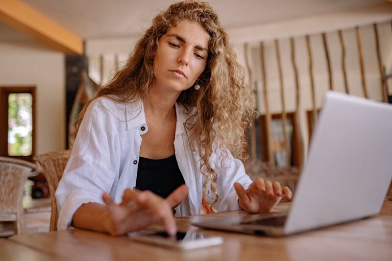 Woman writing in a journal, representing focused emotional healing and self-reflection during a 2-day EMDR Intensive session