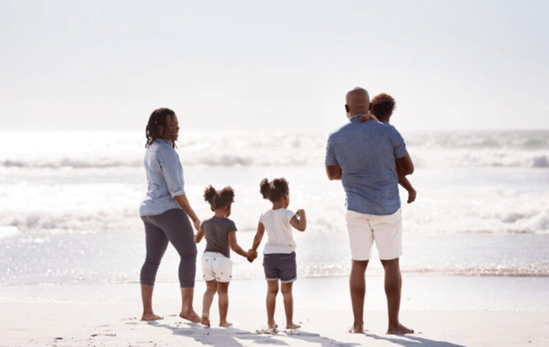 A family watching the ocean waves