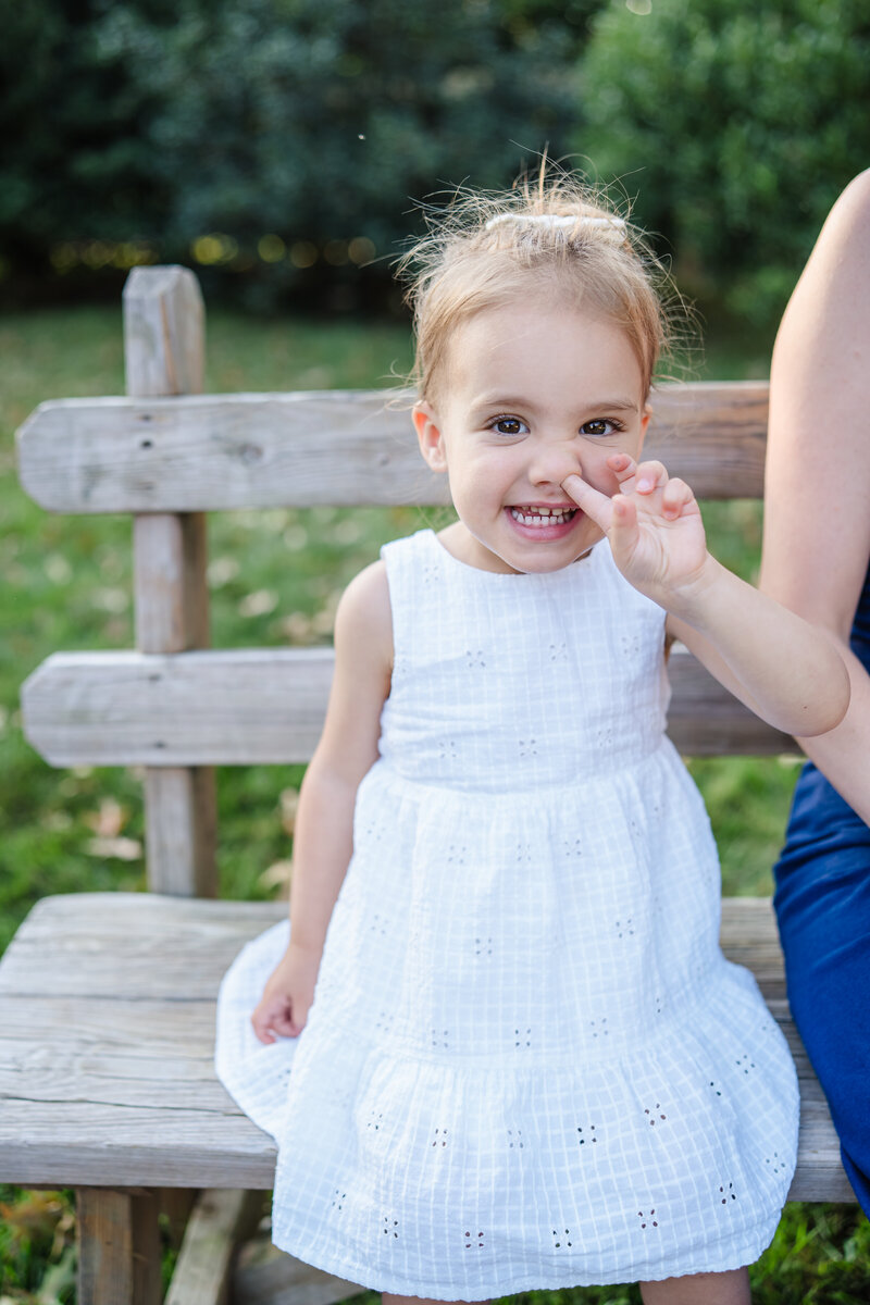 blue bell pa family photo session little girl picking nose white dress