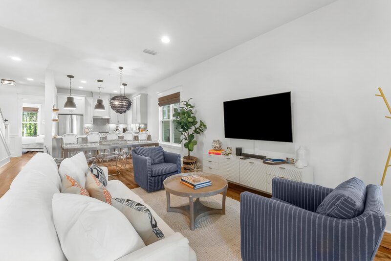 View from living room to kitchen and dining in this sunny, family-friendly Carillon Beach home near 30A.
