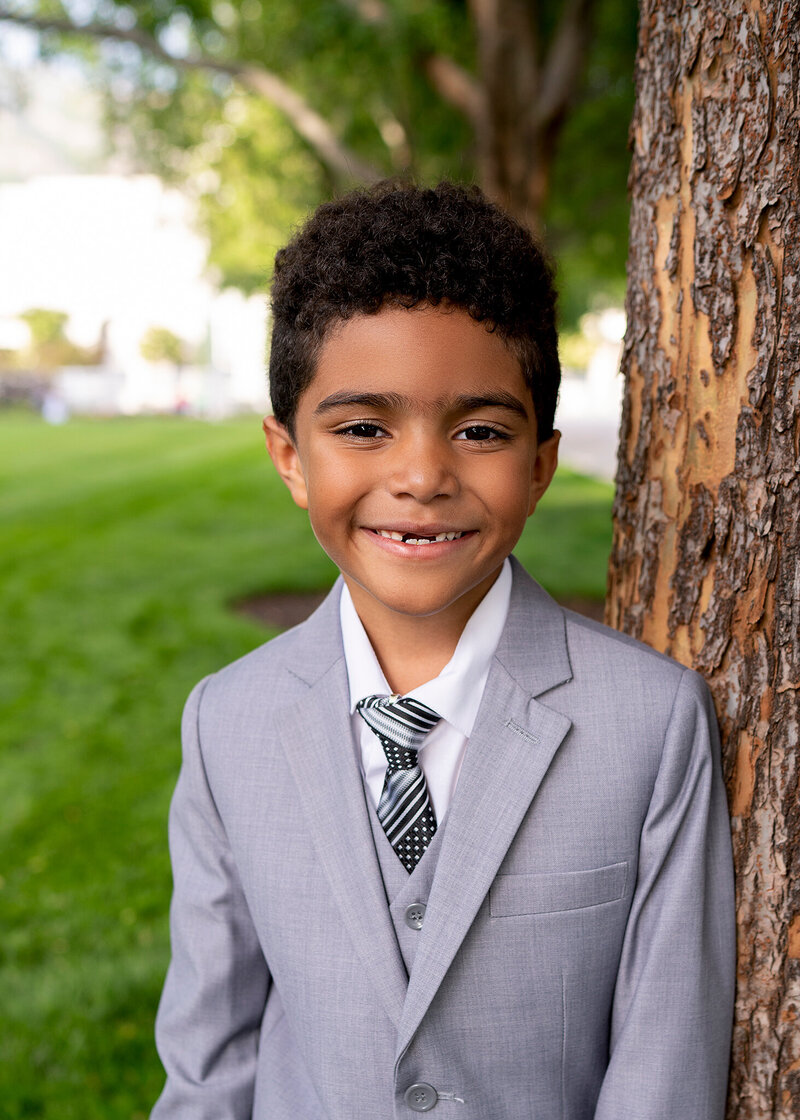 Boy in suit for great to be 8 session