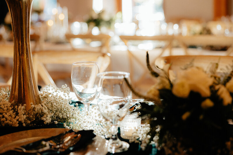 A glass goblet on a table.