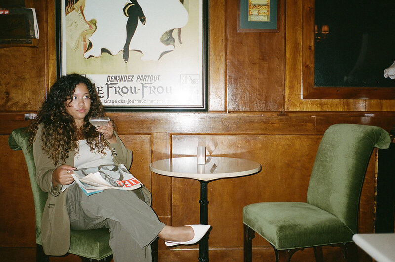 woman sitting at the bar