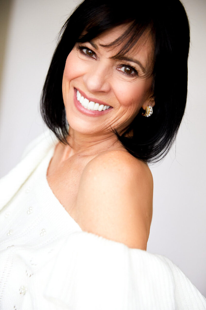 Isabella smiling wearing Lawless Makeup