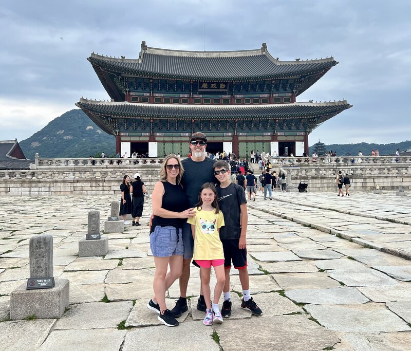Expat family photo in front of Gyeongbokgung Palace in Seoul, South Korea — current home base featured on the Leaving Main Street blog