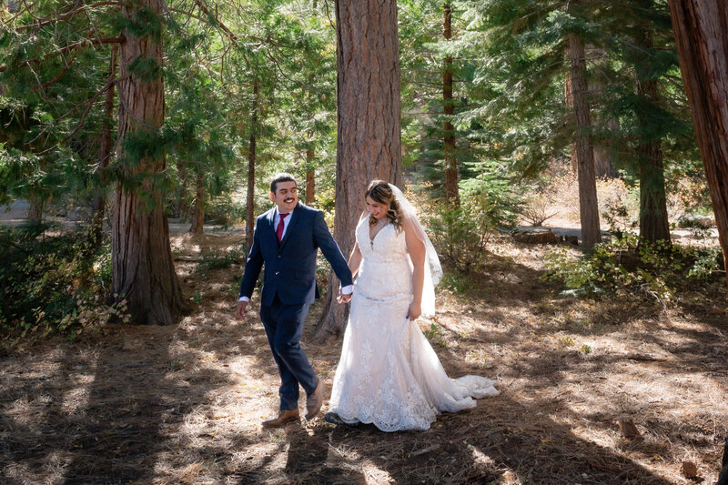 South Lake Tahoe Elopement Emerald Bay Vikingsholm Castle Hike with bride and groom walking during sunset.