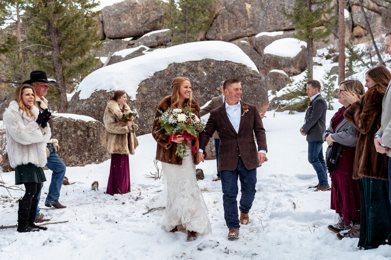 Couple walks together at their Colorado Adventure Elopement