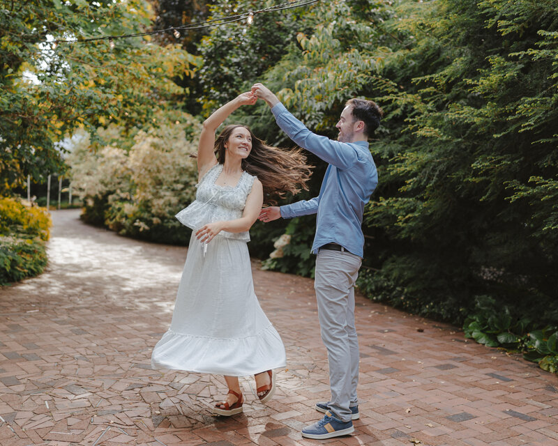 a couple dancing at mcmenamins edgefield engagement photos