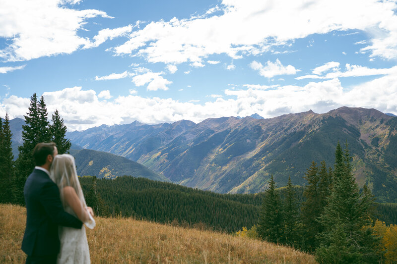 colorado elopement photographer at aspen mountain, bride and groom exploring