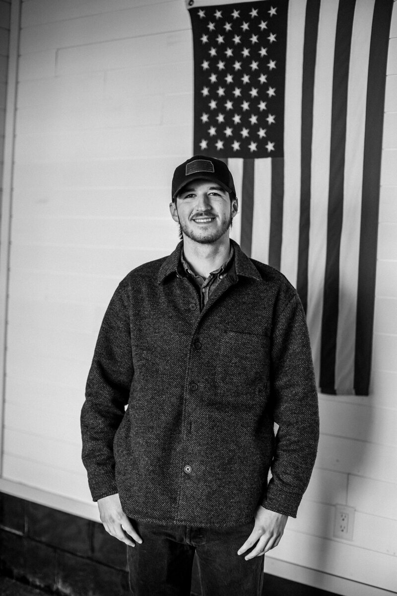 A man standing in a kansas waterfowl lodge