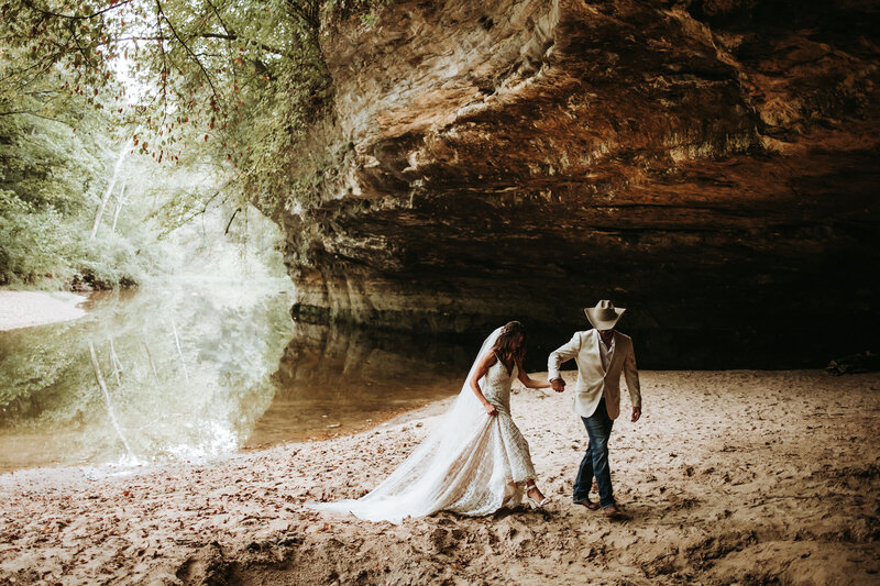 close-up-of-couples-feet-walking-in-ocean