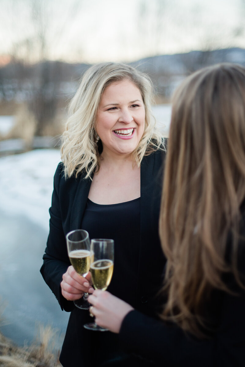 jenny toasting with colleagues