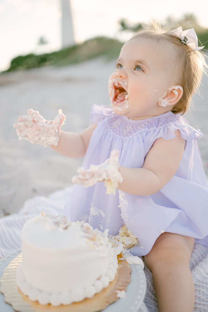 First birthday photos smash cake on the beach