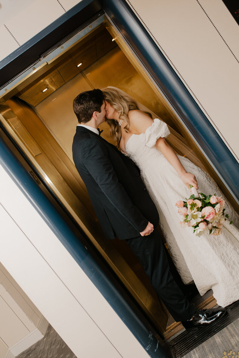 Elegant Bella Terre Vineyard wedding near Omaha, NE, blending luxury and rustic charm. Bride and groom celebrate amidst picturesque vineyard views and timeless architecture, captured by Tori Nichole Photography. A stunning setting for couples seeking a unique and sophisticated venue in the Omaha and Iowa region.