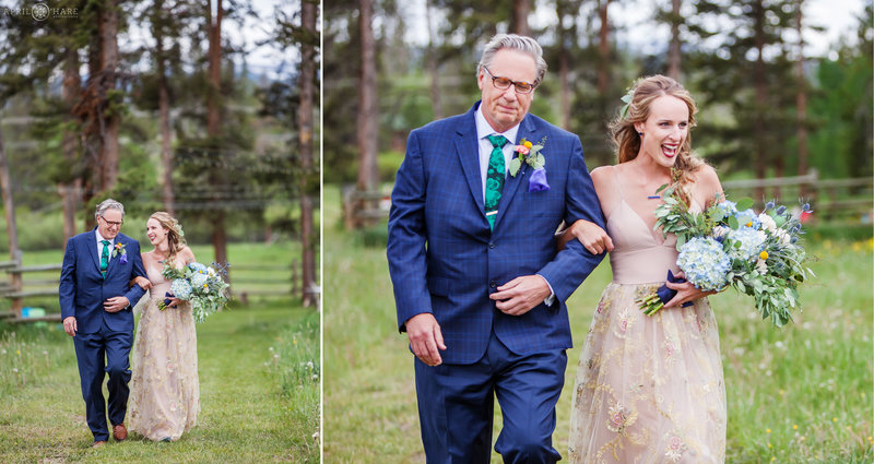 Bride and her dad walk down aisle at her B Lazy 2 Ranch Wedding in Colorado Mountains