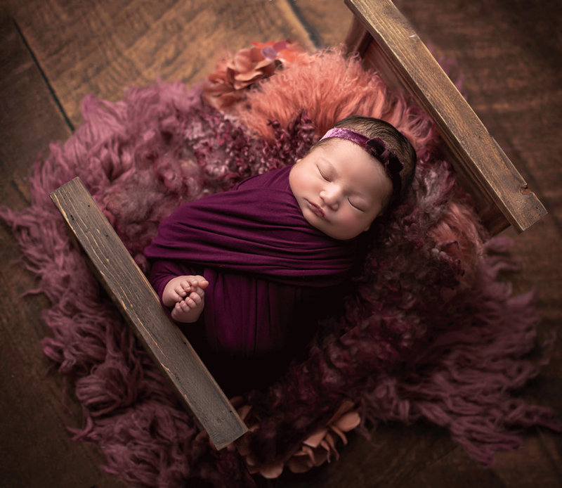 "Ottawa newborn photo – baby peacefully sleeping in studio session"