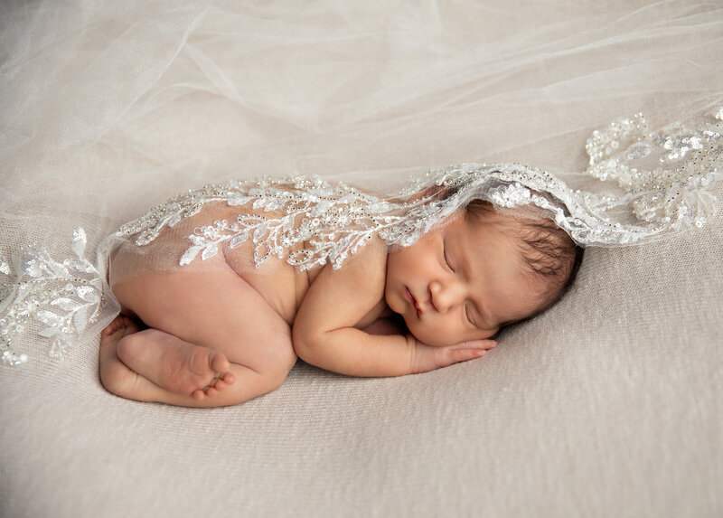 San Antonio baby newborn photography studio lifestyle newborn photographer luxury photo studio wraps outfits posing twin newborns