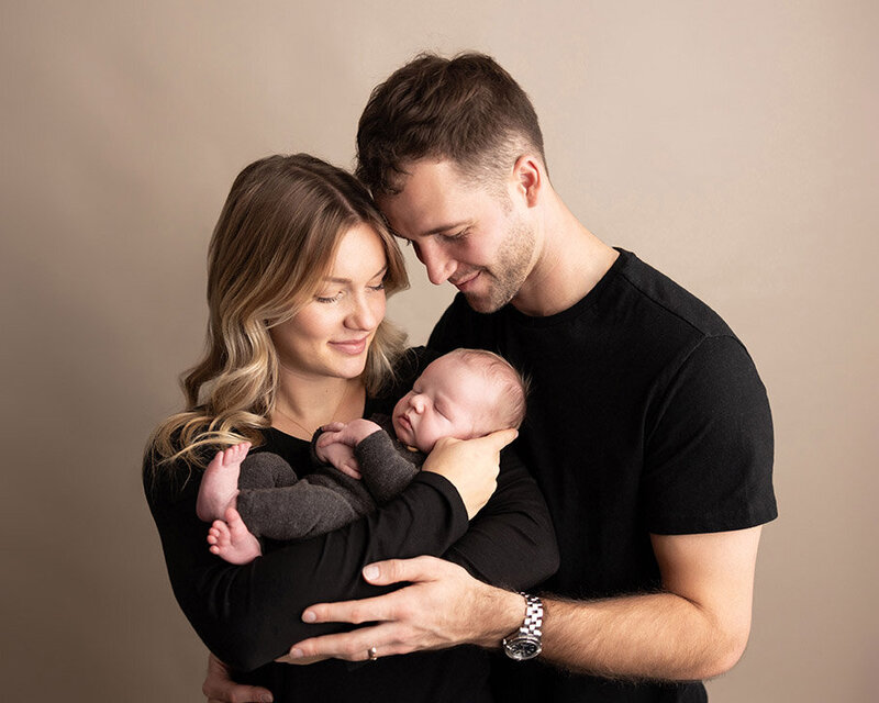 Family together for newborn session in Latrobe photo session.