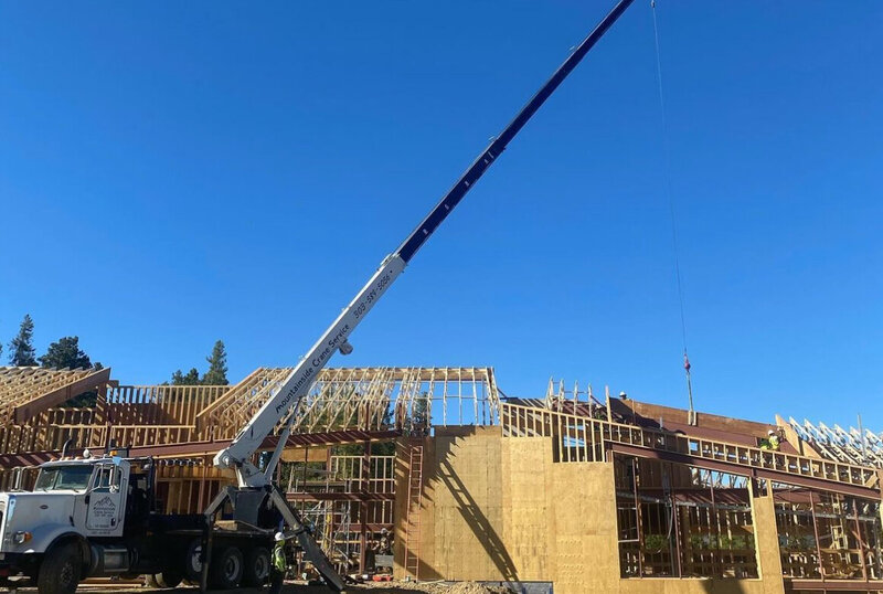 Expert roof installation for new construction projects by Mountainside Crane Service