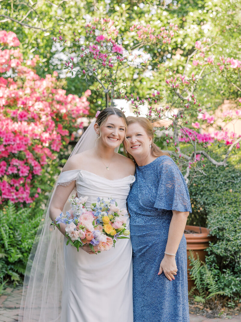 wedding bride and groom savannah georgia forsyth park pink roses