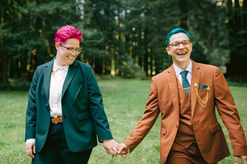 Two Brides on their wedding day wearing suits 